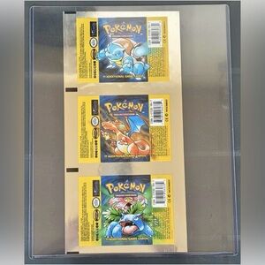 Uncut Pokemon Trading Card Game base booster wrappers.